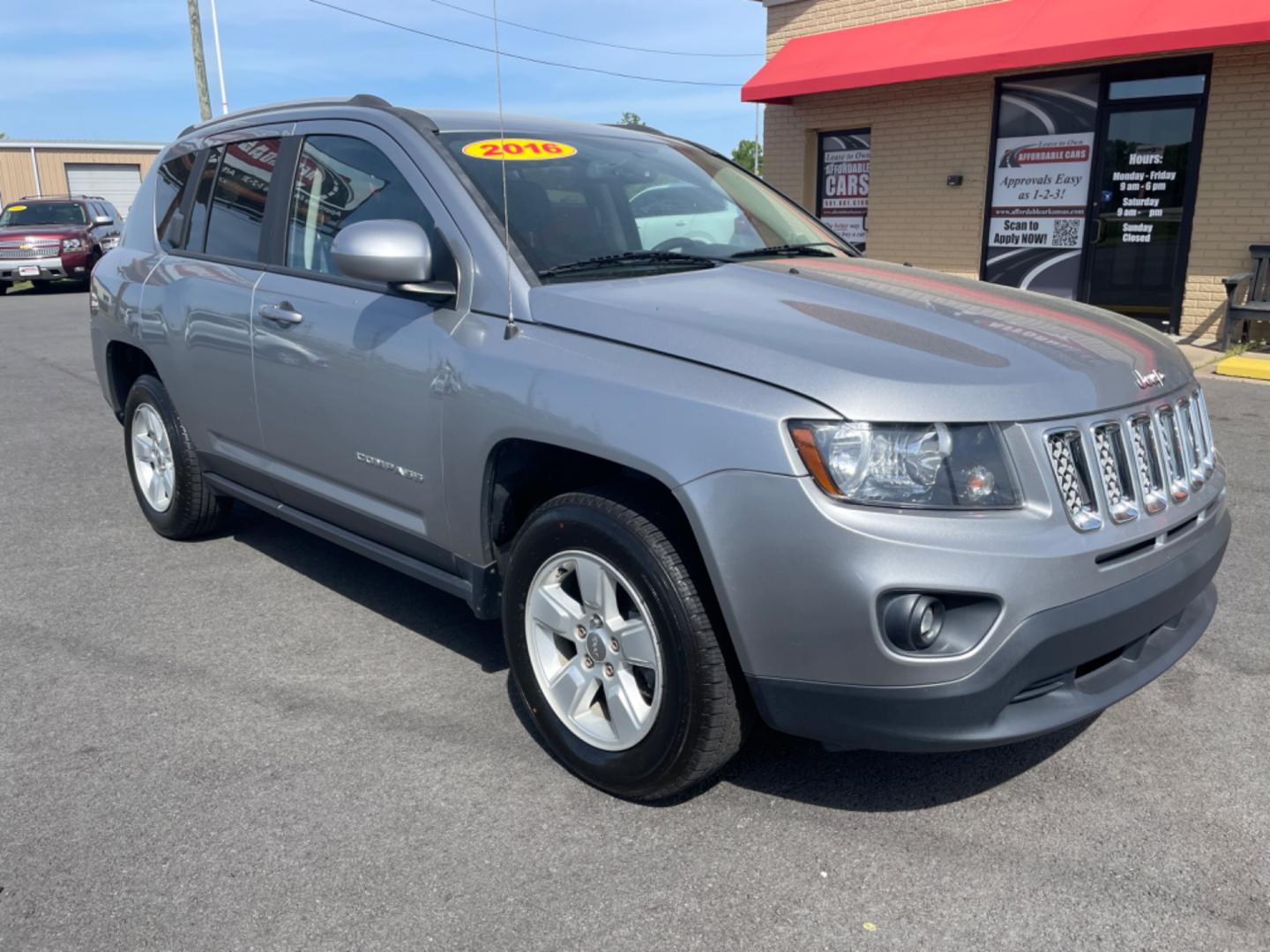 2016 Silver Jeep Compass (1C4NJCEA4GD) with an 4-Cyl, 2.0 Liter engine, Automatic, CVT transmission, located at 8008 Warden Rd, Sherwood, AR, 72120, (501) 801-6100, 34.830078, -92.186684 - Photo#1